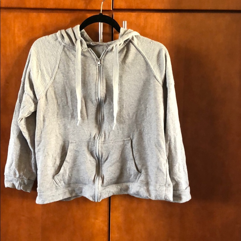 Crop sweatshirt w/ cross back. Size M. Never worn